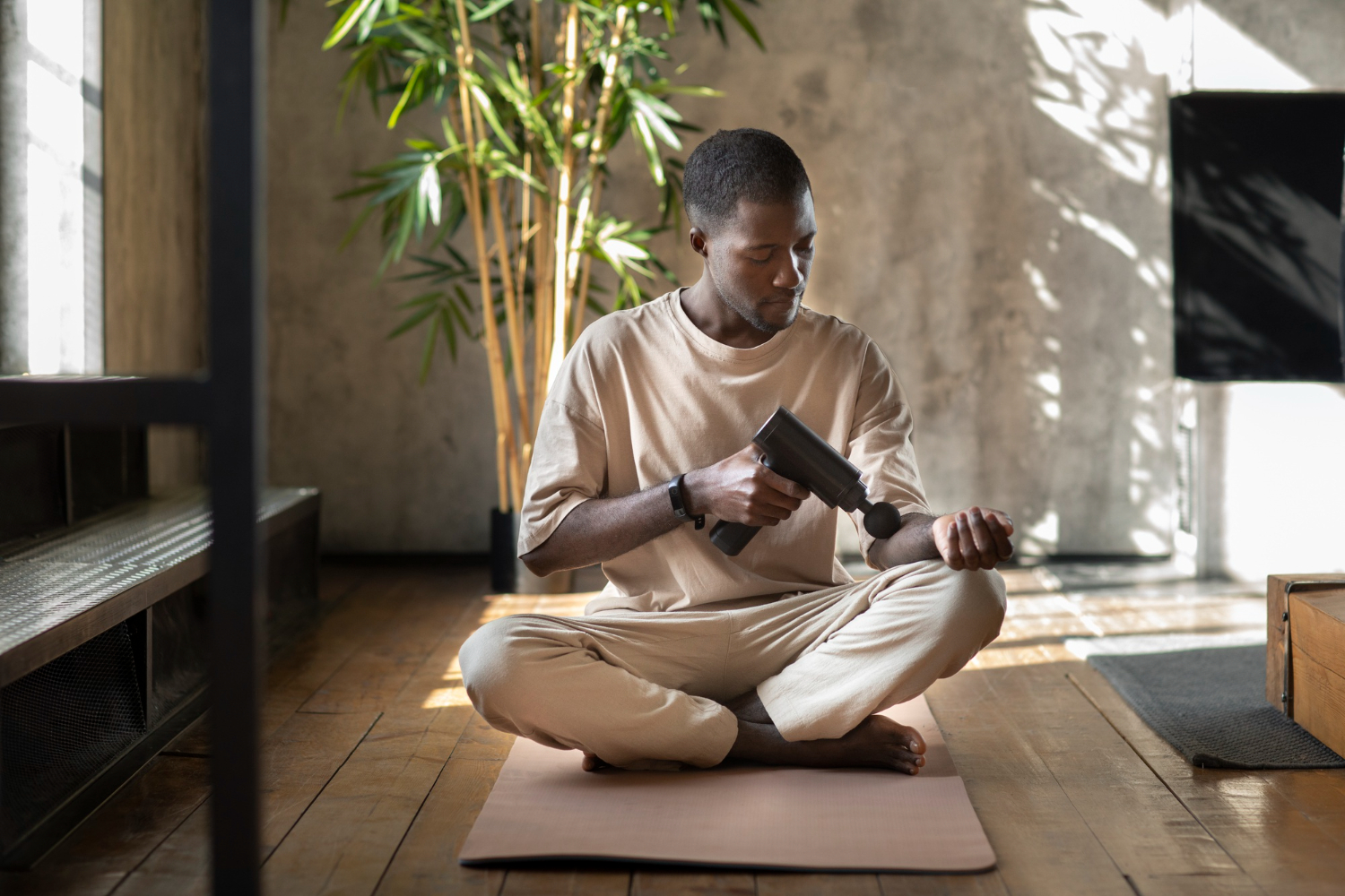 9 Tips on How to Avoid Burnout for Canadian Nurses and Healthcare Staff, man massaging arm doing yoga