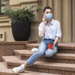 Rural Facilitiesn nurse sitting on staircase